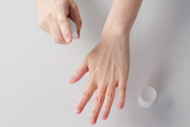 using hand sanitizer, disinfect hands - Foto, imagen