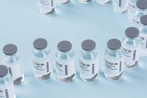Ковид 19 вакцины, мяты цветной фон - Фото, изображение