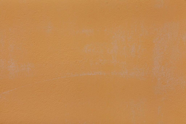 Cement walls painted in yellow-brown vintage texture and background seamless - Photo, Image