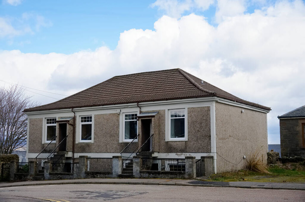 Maison de conseil abandonnée dans un bidonville pauvre avec de nombreux problèmes de protection sociale à Port Glasgow - Photo, image