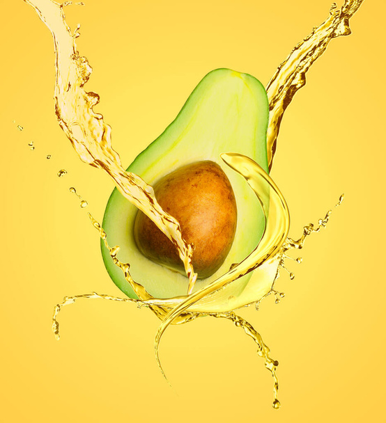 Ripe avocado and natural essential oil on yellow background - Foto, Imagem