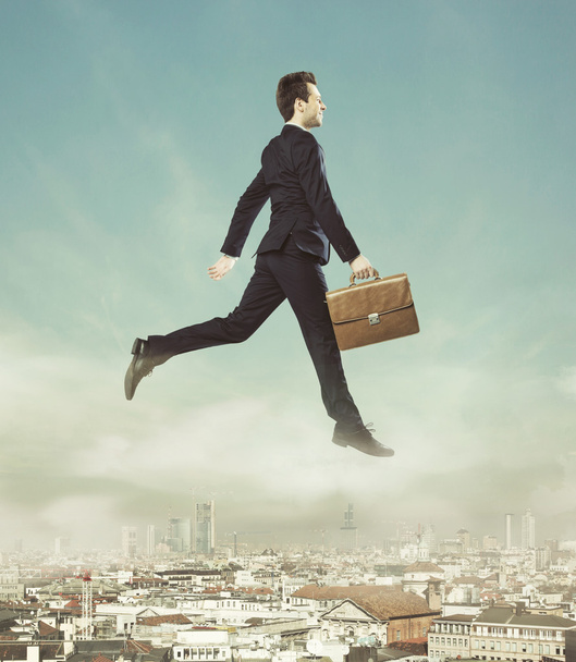 Conceptual photo of flying businessman - Photo, Image
