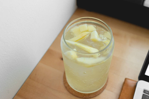 Relax summer day with Lemon Soda and working on the laptop. Work from home. - Photo, Image