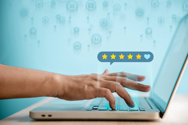 Customer Experiences Concept. Happy Client Using Smartphone to Giving Best Excellent Review Rating for Online Satisfaction Surveys. Positive Feedback on Mobile Phone - Fotó, kép