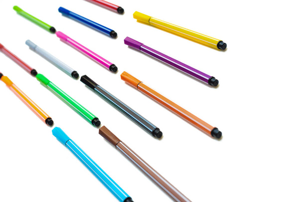 A pile of colorful felt tip pens isolated on the white background. - Foto, imagen
