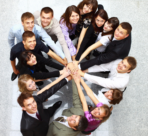 Top view of business with their hands together in a circle - Фото, изображение