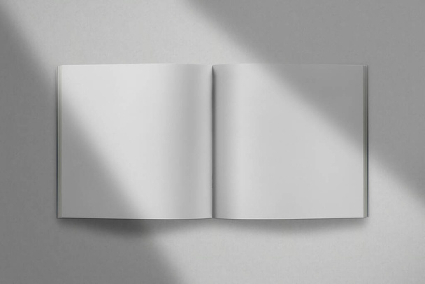 Kwadratowa broszura makietowa odizolowana na białym tle teksturowana biały papier tło - Zdjęcie, obraz