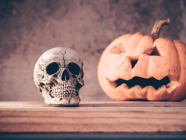 halloween background with skull and pumpkin - Фото, изображение