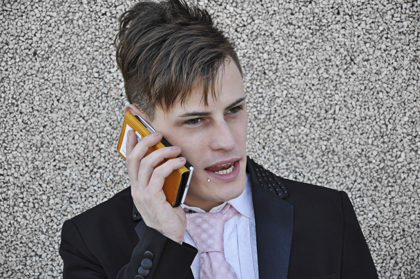 Businessman talking on the phone - Valokuva, kuva