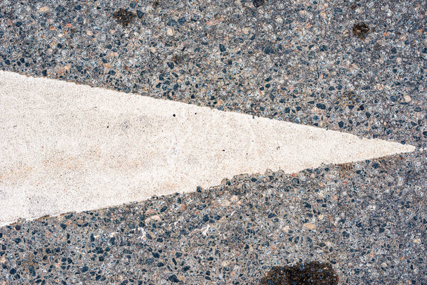 Old asphalt on the road. Horizontal road markings. City  - 写真・画像