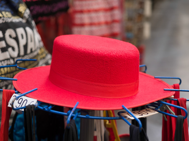 Punainen hattu myytävänä Granada
 - Valokuva, kuva