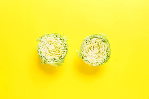 Fresh cut cabbages on color background - Φωτογραφία, εικόνα