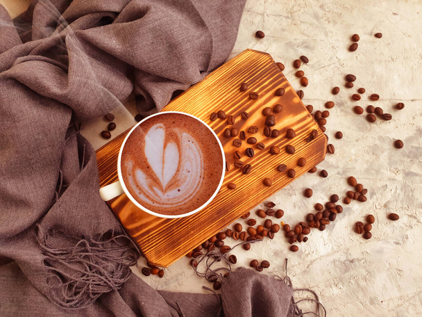 cup of coffee beans on wooden background - Photo, Image