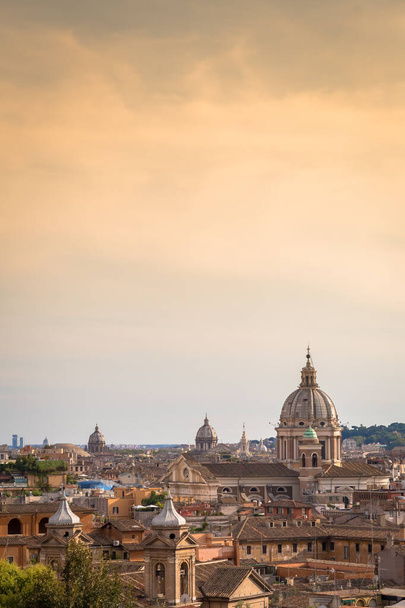 ROME, ITALY- CIRCA AUGUST 2020: panoramic cityscape with sunset sky and clouds - Fotografie, Obrázek