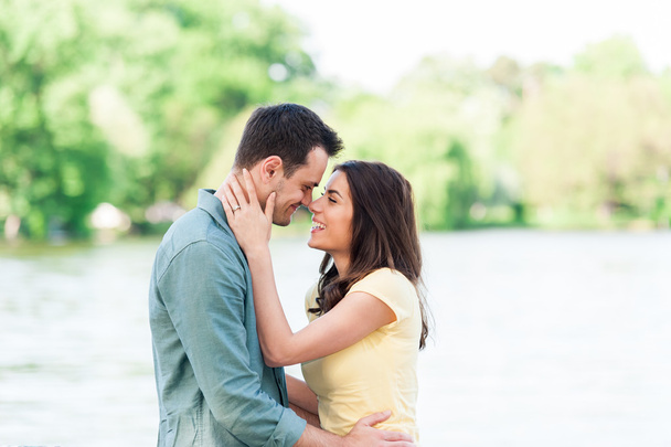Close up portrait of attractive young couple in love outdoors. - Foto, afbeelding
