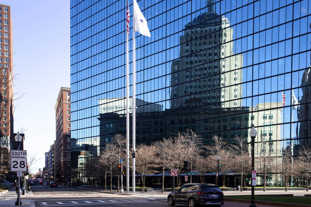 Boston, MA - April 8 2021: Back Bay neighborhood of Boston with office buildings and reflection in the glass windows. Center of Boston at Boylston Street. - Photo, Image