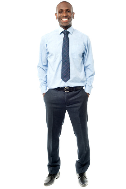 Businessman with hands in pockets - Foto, immagini