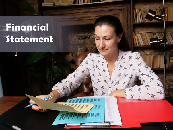 Legal concept meaning Financial Statement Businesswoman, executive manager hand filling paper business ▲ en - Fotografie, Obrázek