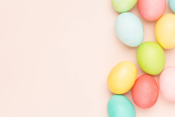 Happy Easter card with easter eggs in cream colors. Minimal easter concept with copy space for web banner. Copy space for text. Top view, flatlay. - Photo, Image
