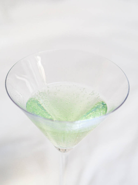 A martini glass on a white background - Foto, Imagem