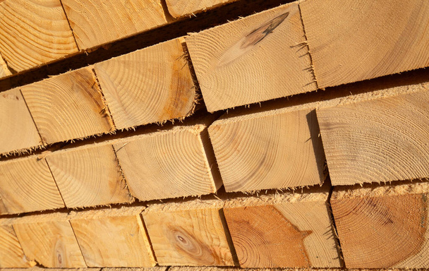 Stack of new wooden studs at the lumber yard - Foto, immagini