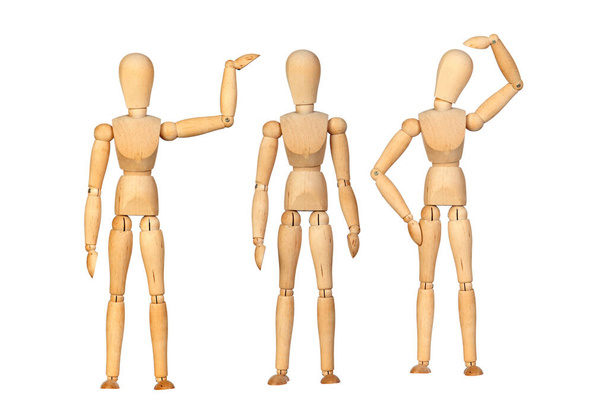 Mnoho dřevěné figuríny dělá různé gesta izolované na bílém pozadí - Fotografie, Obrázek