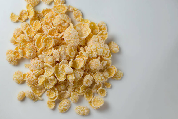Glazed cornflakes on a light background. - Foto, Imagem