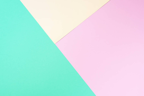 Colorful trendy green and pink paper background. Top view. Copy space - Фото, изображение