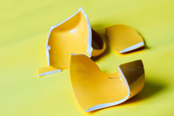 Broken cup to pieces. Smash ceramic dishes. - Photo, image