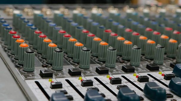 Sound mixer with continuous colored adjustment buttons and loudspeaker adjustments - Photo, Image