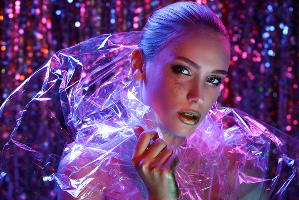 High Fashion model girl in colorful bright neon lights posing in - Photo, image