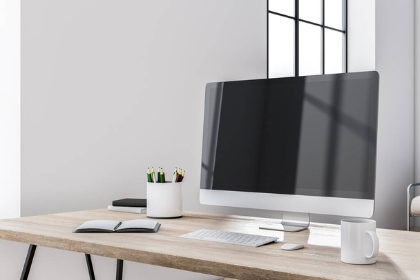 Lieu de travail de style éco ensoleillé avec écran d'ordinateur moderne sur une table en bois avec tasse à café sur fond mural clair. rendu 3D - Photo, image