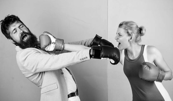 victims. knockout punching. who is right. win the fight. problems in relationship. sport. bearded man hipster fighting with woman. Strength and power. family couple boxing gloves - Фото, зображення