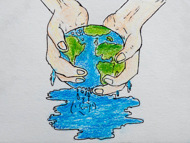 Dibujos de un niño de 9 años dibujado con lápiz y lápices de colores, dibujo ahorrar agua en la tierra sobre papel blanco. - Foto, Imagen