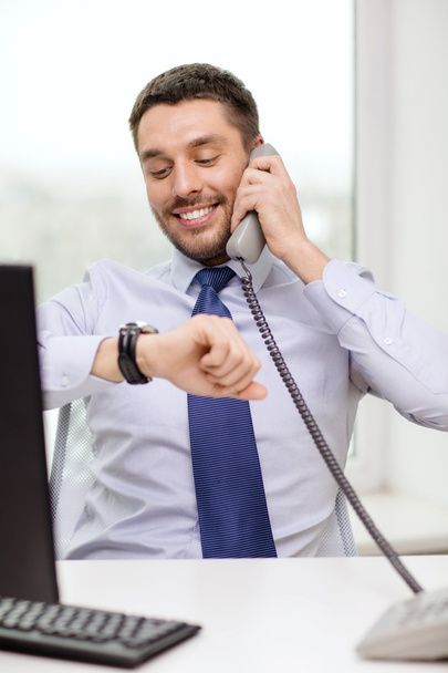 smiling businessman making call - Fotó, kép
