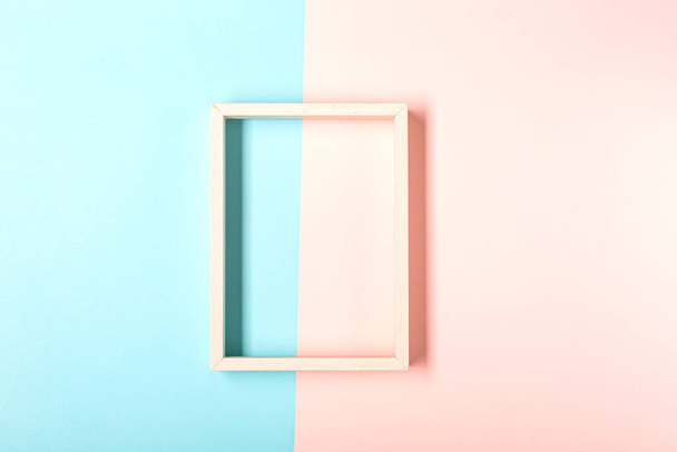 Picture frame design with shadow on pastel pink and blue background - Valokuva, kuva