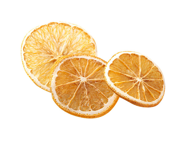 Круглі скибочки сушеного апельсина, ізольовані на білому тлі
 - Фото, зображення
