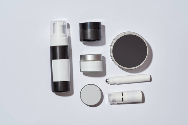 Cosmetological cans for skin therapy on white background - Valokuva, kuva