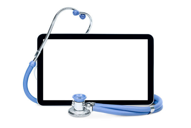 digitale tablet en stethoscoop op geïsoleerde witte achtergrond. geneeskundig concept - Foto, afbeelding