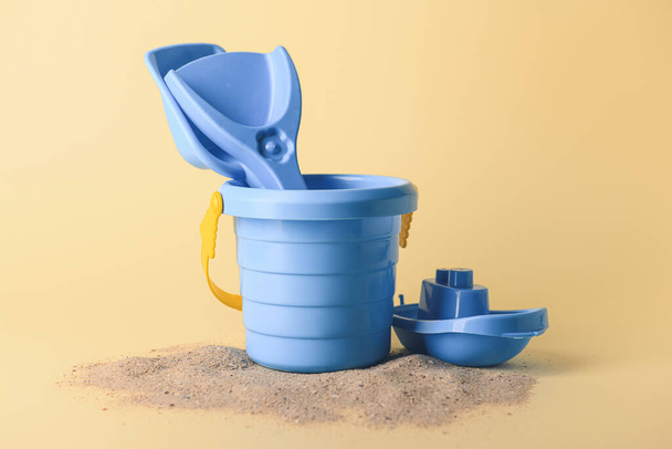 Set of beach toys for children on color background - Фото, изображение