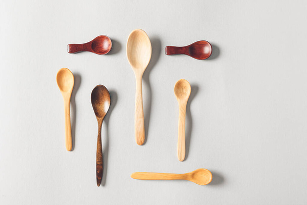 Wooden spoons on white background - Photo, image