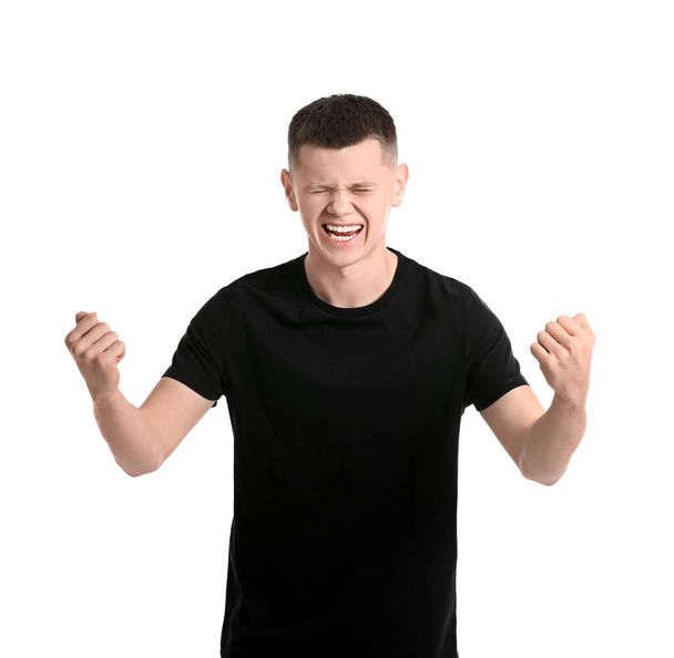 Portrait of happy young man on white background - Foto, Imagen