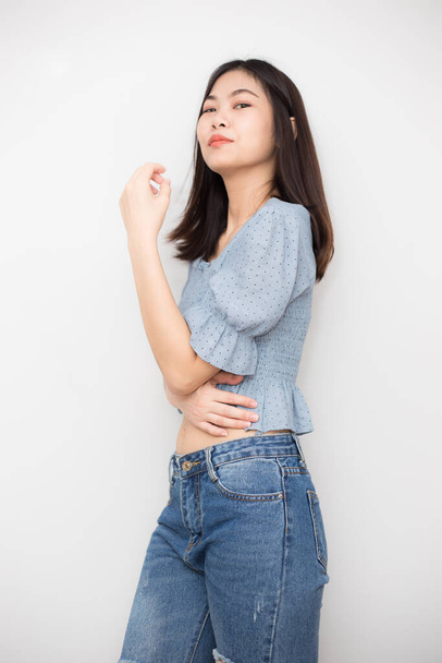 Sexy asian women wear blue jean standing on white background beautiful young asian women - Foto, immagini