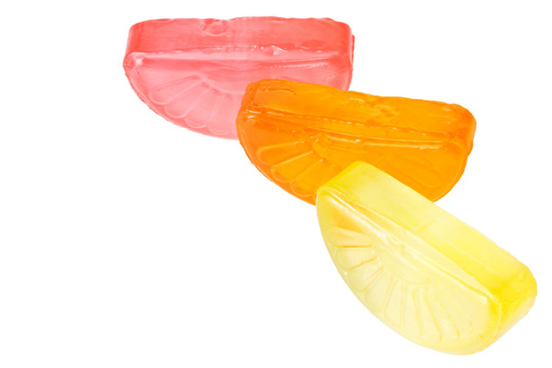 Фруктові краплі лимона, апельсина та грейпфрута ізольовані на білому
 - Фото, зображення