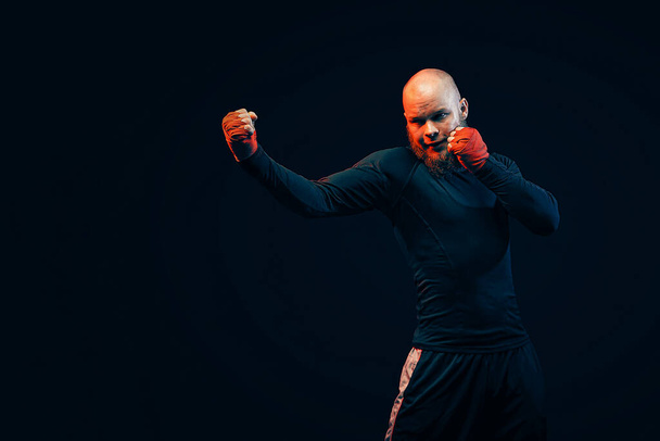 Sportsman boxer fighting on black background, Boxing sport conce - Zdjęcie, obraz