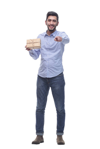 happy young man with a gift in craft-paper. - Foto, Imagem