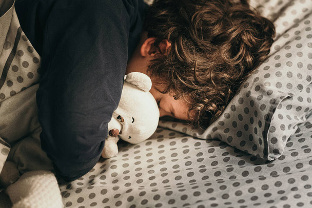 Portrait of  Young Boy is Sleeping at Bed - Φωτογραφία, εικόνα