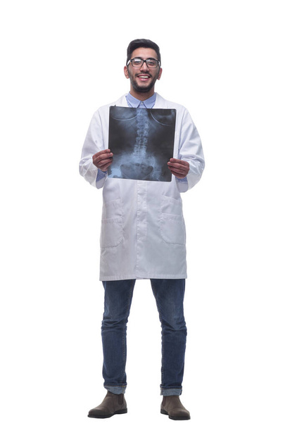 attending doctor looking at the x-ray. isolated on a white background. - Foto, Bild