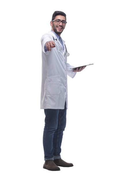 attending doctor with the clipboard pointing at you . - Foto, imagen