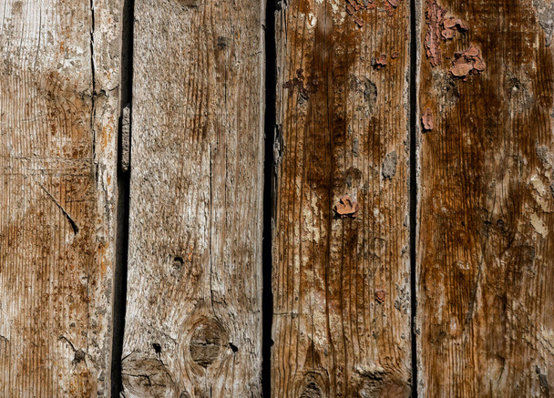 natural background of wooden boards with skinned paint and cracks - Foto, Bild